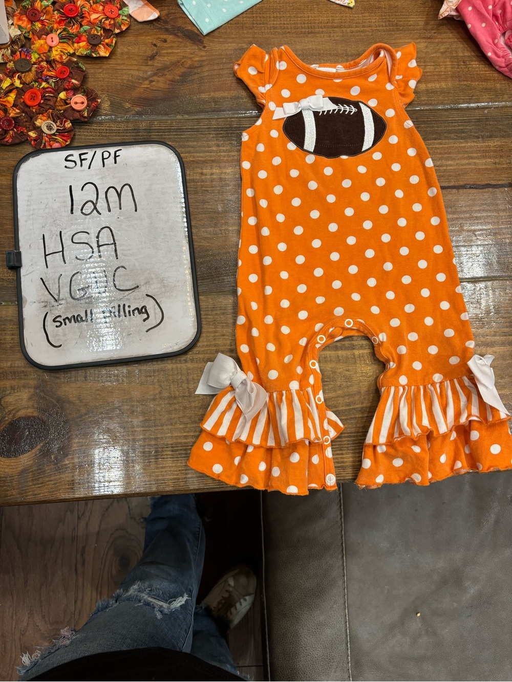 Orange Polka Dot Football Ruffle Romper